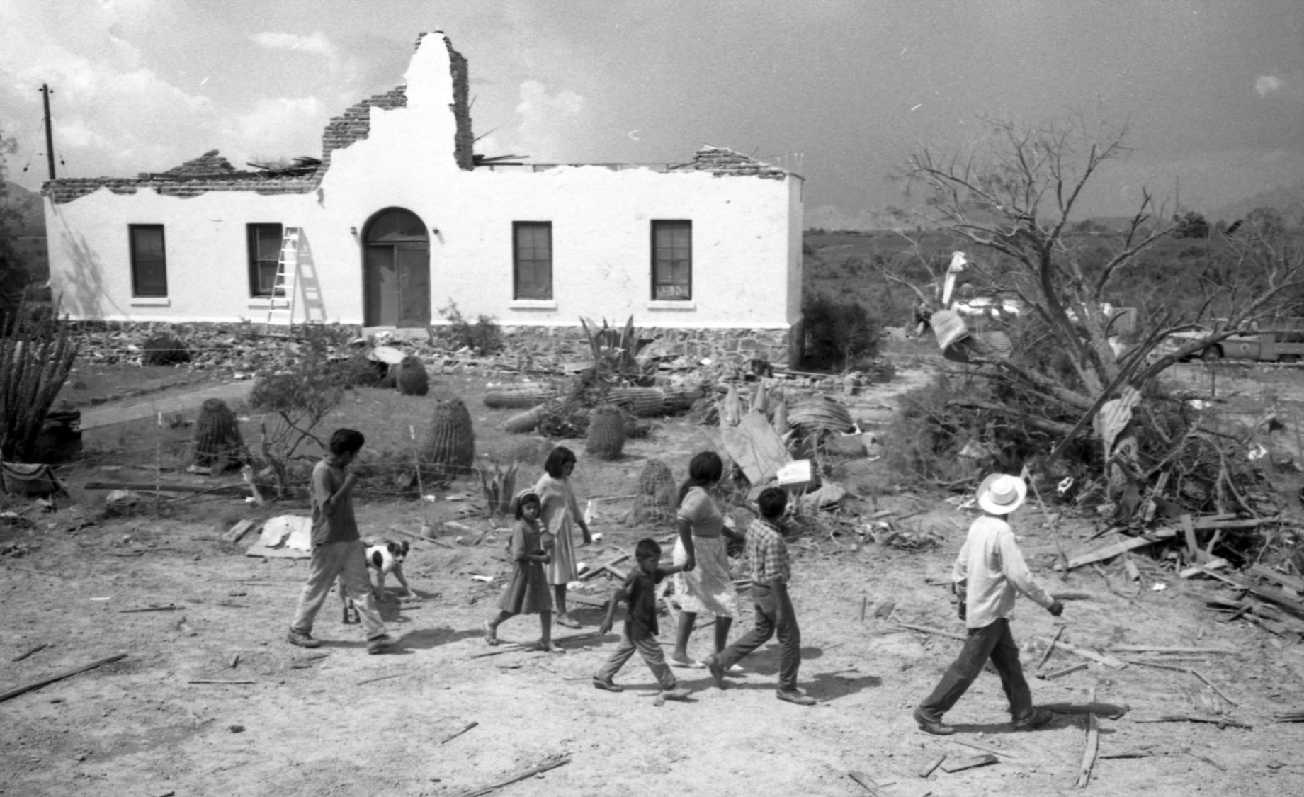 Hearing about a tornado devastating the community around San Xavier